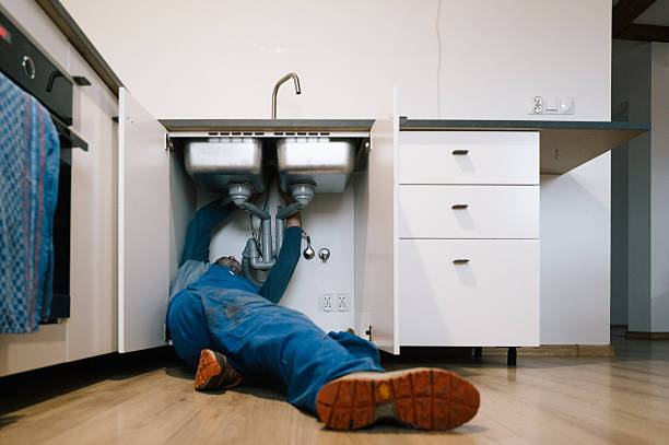 Professional Drain Cleaning technician working in Choccolocco, AL